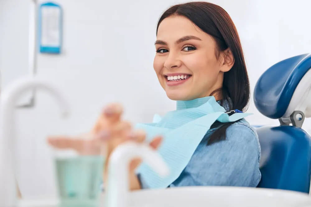 Dentist restoring a filling or crown