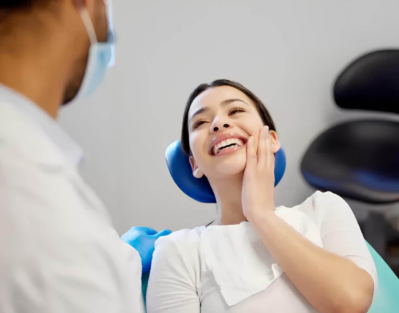 Dentist in consultation with patient